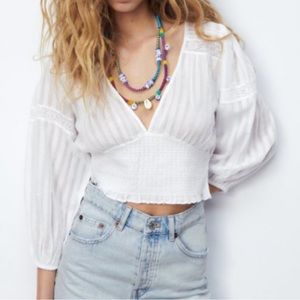 Zara Contrast top v-neck shirt with long puff sleeves, smocked elastic hem
